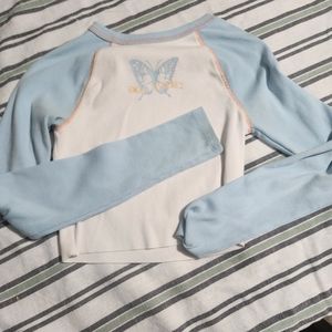 A blue and white long sleeve top